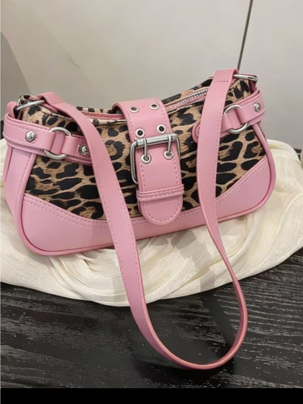 Purse brand new faux leather. Made nicely and very eye catching